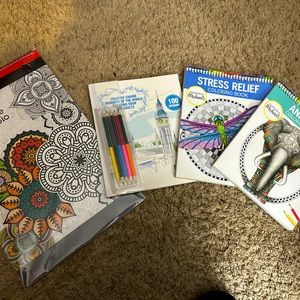 Three coloring books and one kaleidoscope coloring pad